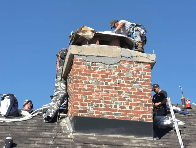 Fallbrook Chimney Sweep installing a custom chimney crown in Fallbrook, CA